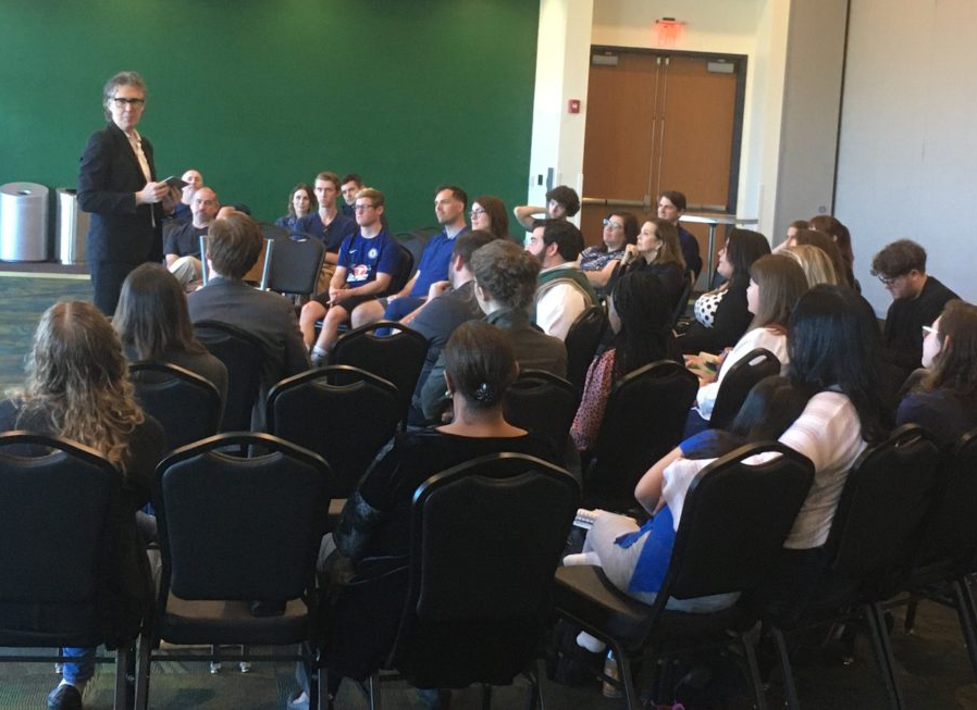 Ira Glass talking to a roomful of students.