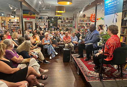 A book reading at Tombolo Books featuring a conversation between Armstrong and NPR TV Critic Eric Deggins 