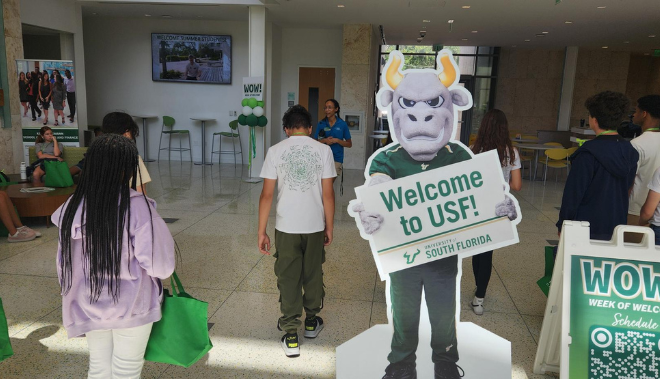Large cutout poster or Rocky welcoming students 
